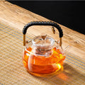 DecorBites™ Glass Tea Pot With Weave Handle Heat-resistant Glass Teapot Transparent Steaming Tea Kettle