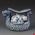 DecorBites™ Blue White Porcelain Child Sleep Dragon Boat Statue