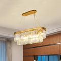 DecorBites™ Contemporary Crystal Island Pendant with 7 Bulbs and Gold Finish - 2 Layer Ellipse Design