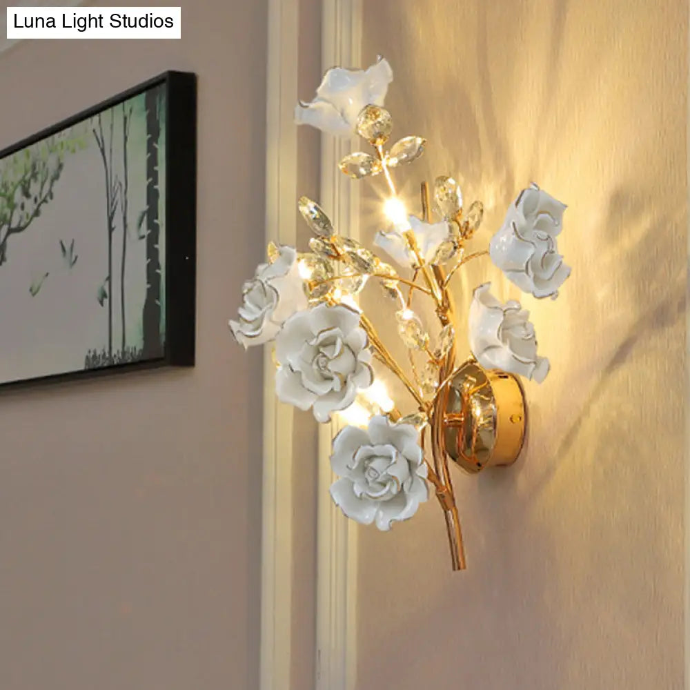 DecorBites™ Contemporary Gold Crystal Wall Lamp with Teardrop Faceted Design and Ceramic Flower Accents - 3 Bulb Wall Light Fixture