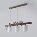DecorBites™ Contemporary Wood Island Pendant with Nutcracker Design and Cylindrical Glass Shades - Set of 3 Lights