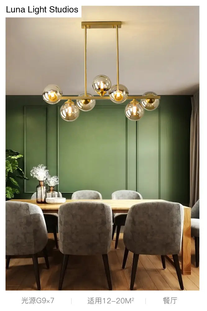 DecorBites™ Mid-Century Modern Gold Metal Pendant with Spherical Amber Glass - Island Ceiling Light for Dining Table
