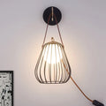DecorBites™ Minimalist Black LED Wall Sconce with Leather Handle - Pear Cage Iron Design