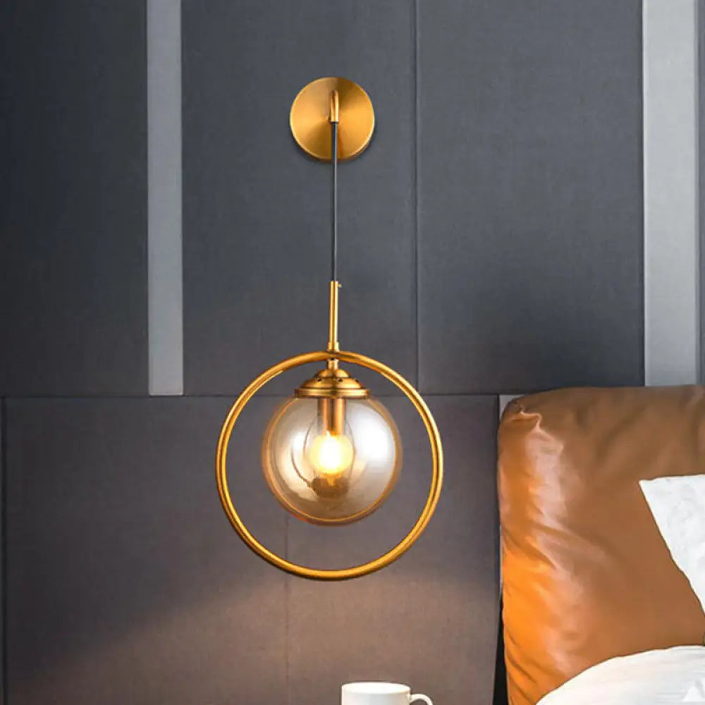 DecorBites™ Modern Brass Wall Sconce with Glass Sphere Shade for Bedside Lighting