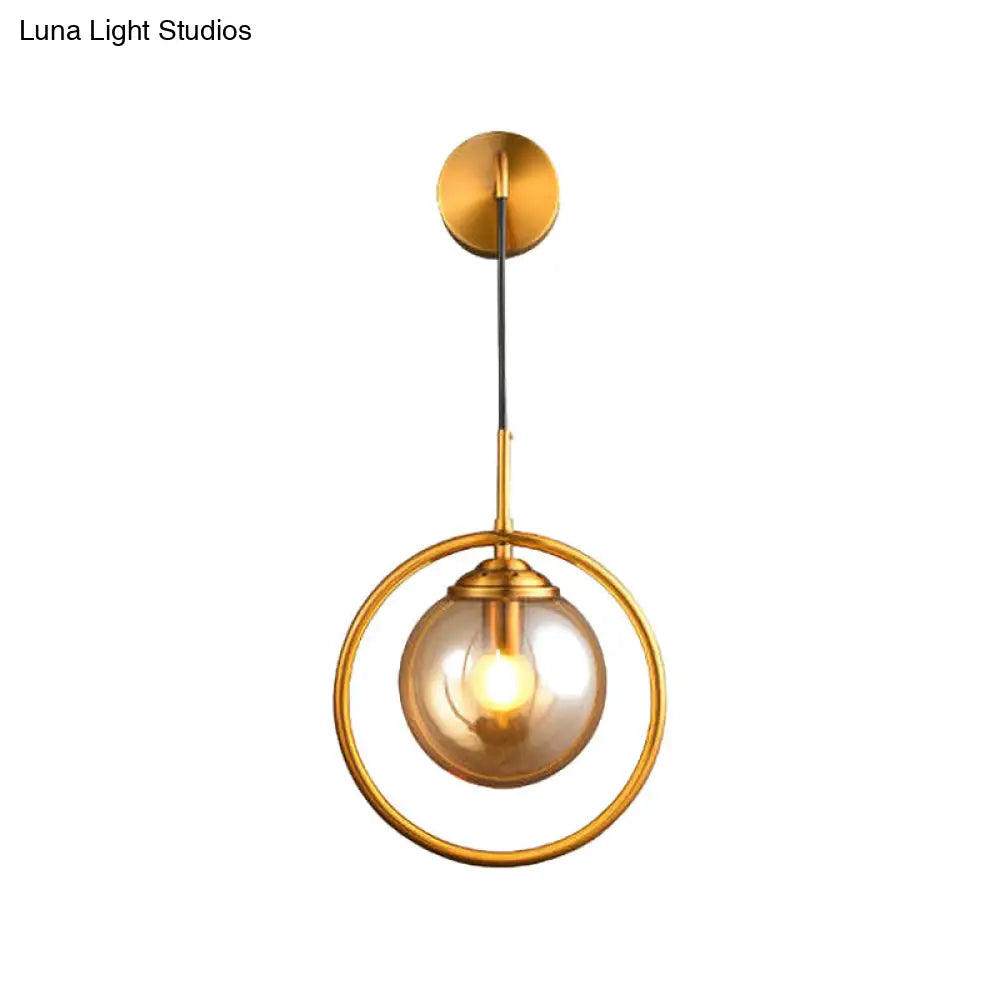 DecorBites™ Modern Brass Wall Sconce with Glass Sphere Shade for Bedside Lighting