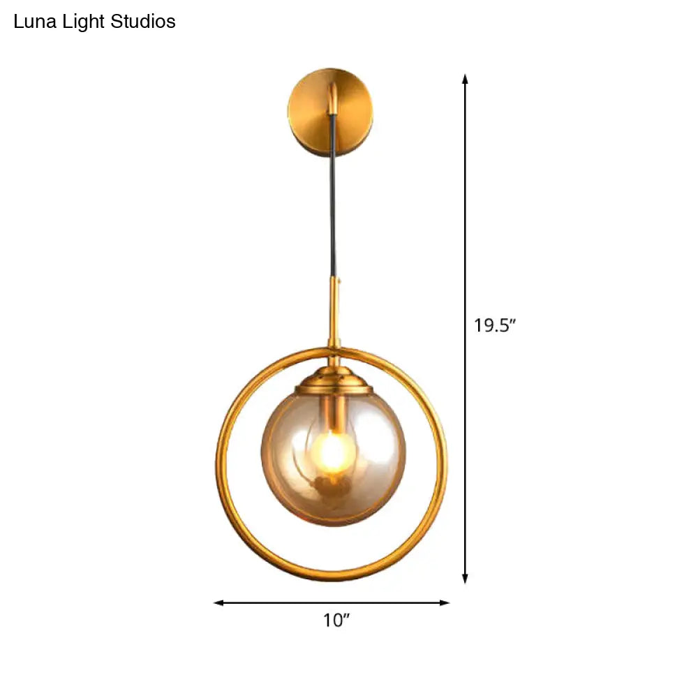 DecorBites™ Modern Brass Wall Sconce with Glass Sphere Shade for Bedside Lighting