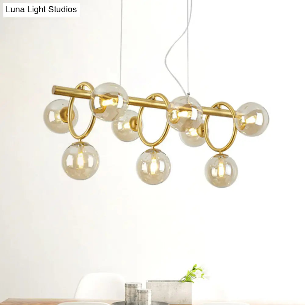 DecorBites™ Modern Gold Round Pendant Lighting - 9 Bulb Cognac Glass LED Island Lamp with Linear Design