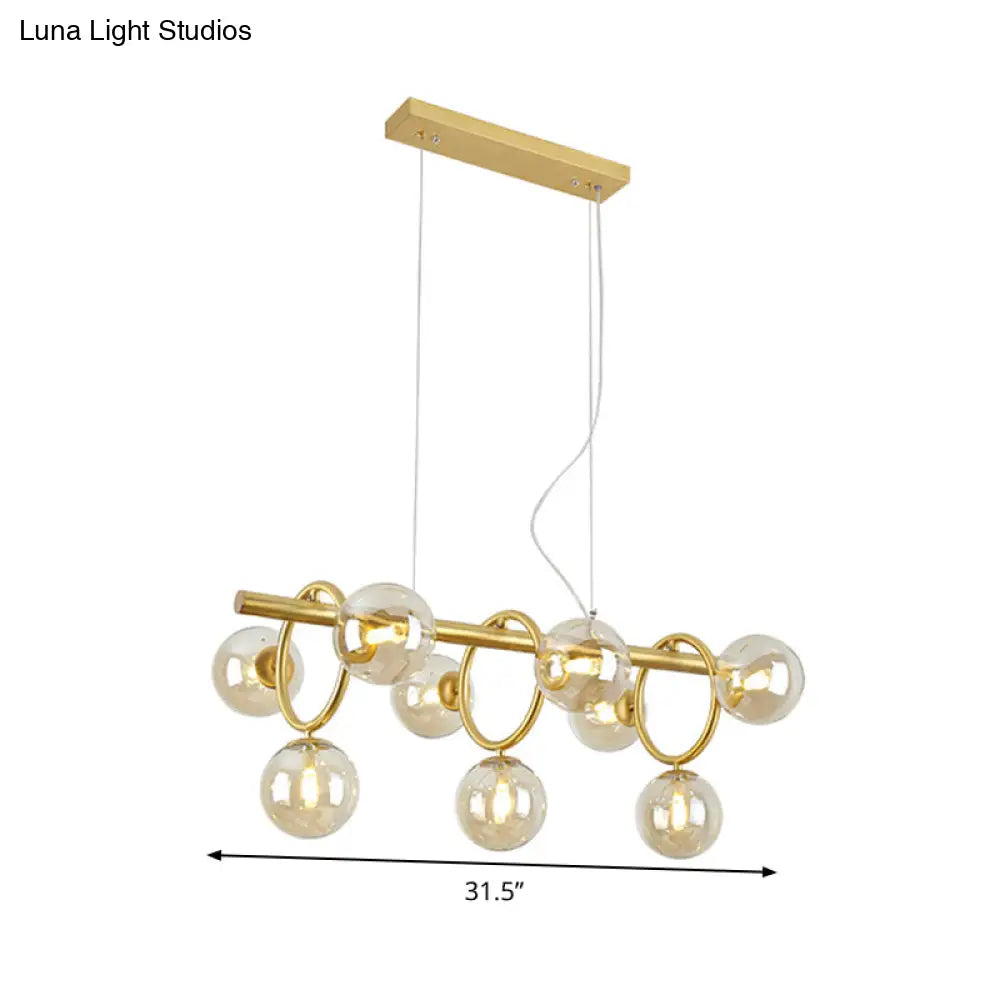 DecorBites™ Modern Gold Round Pendant Lighting - 9 Bulb Cognac Glass LED Island Lamp with Linear Design