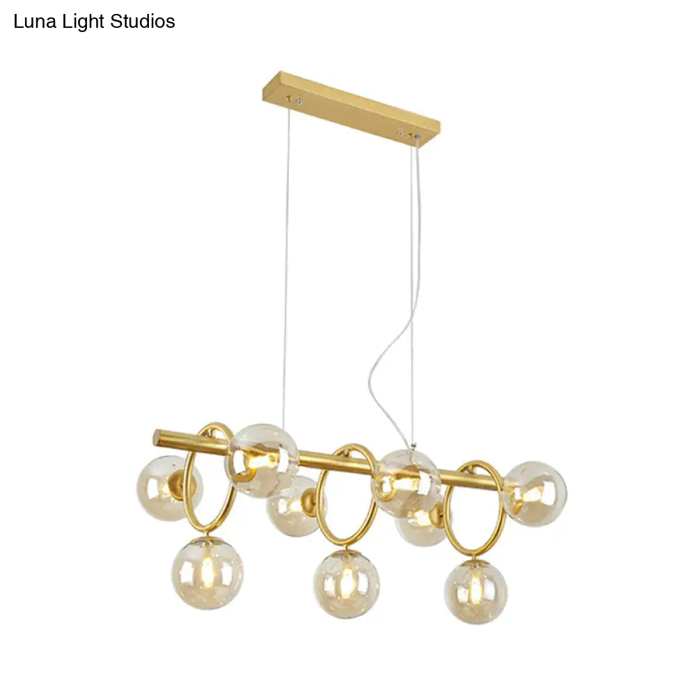 DecorBites™ Modern Gold Round Pendant Lighting - 9 Bulb Cognac Glass LED Island Lamp with Linear Design