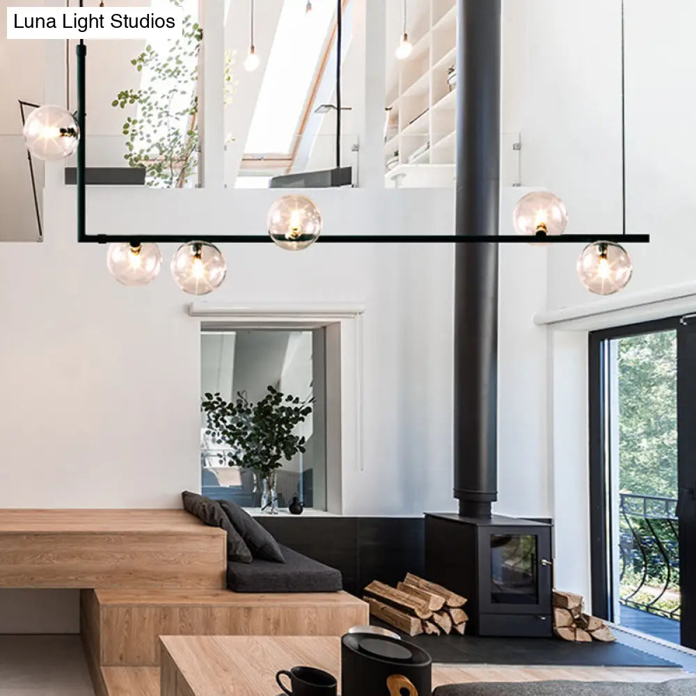 DecorBites™ Modern Minimalism Black Linear 6-Light Island Pendant Lighting with Sphere Glass Shade for Living Room.