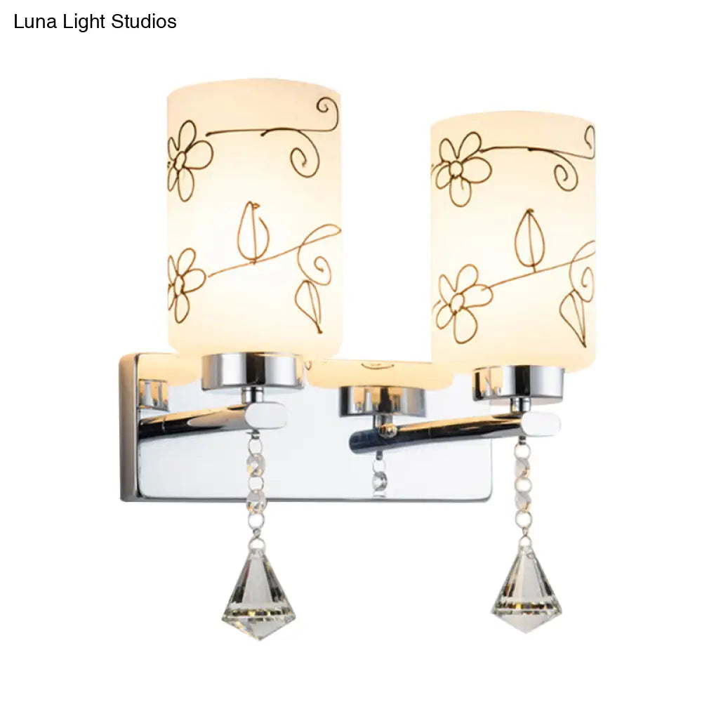 DecorBites™ Modern White Glass Cylinder Wall Sconce with 2 Bulbs, Chrome Finish and Elegant Flower Pattern