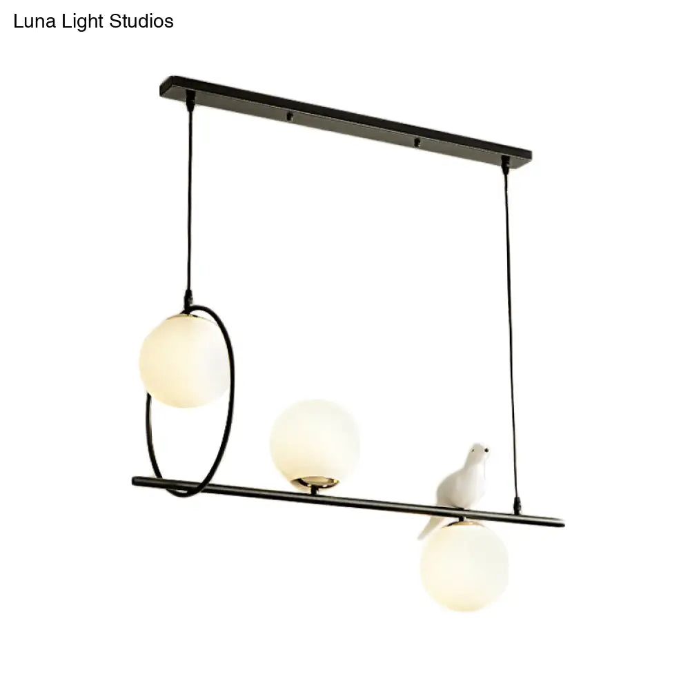DecorBites™ Modernist Milk Glass Pendant Lamp with 3 Globe Heads and Bird Accent - Black Finish