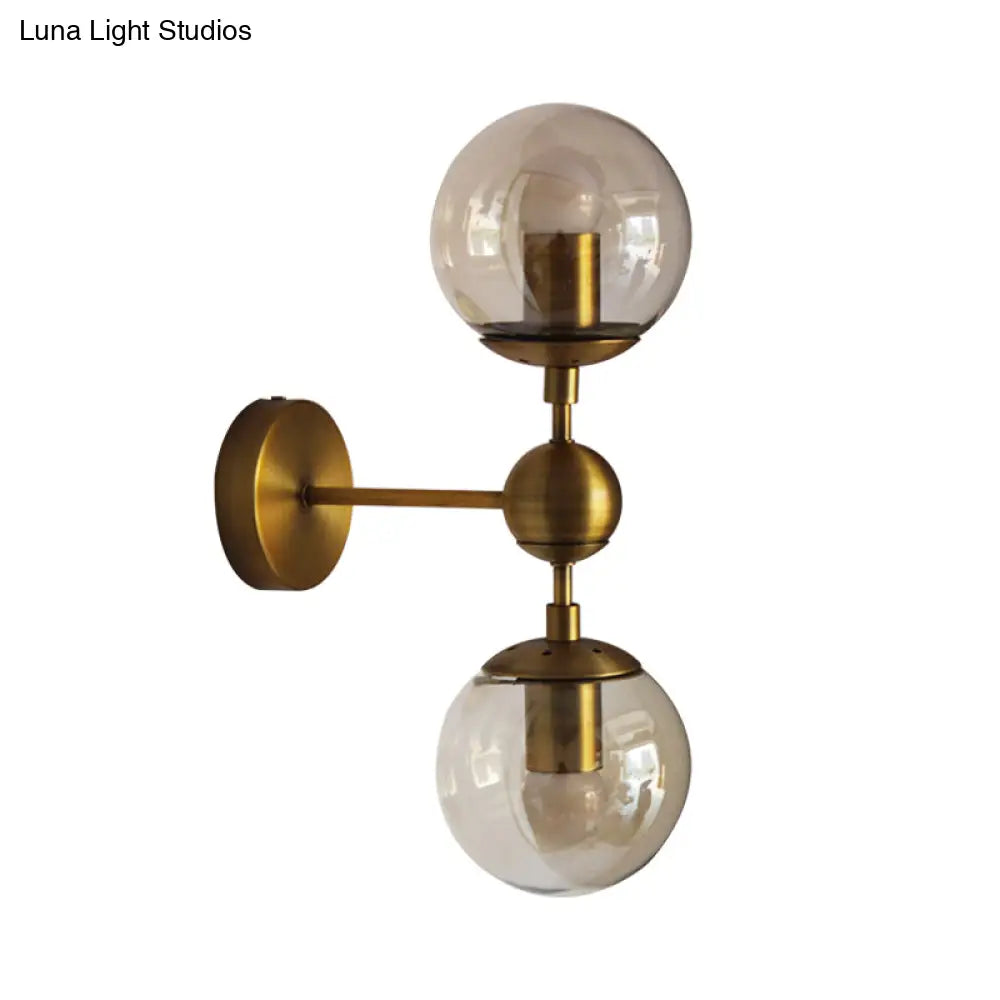 DecorBites™ Post Modern Amber Glass Globe Wall Sconce with Brass Mount - 1/2 Light