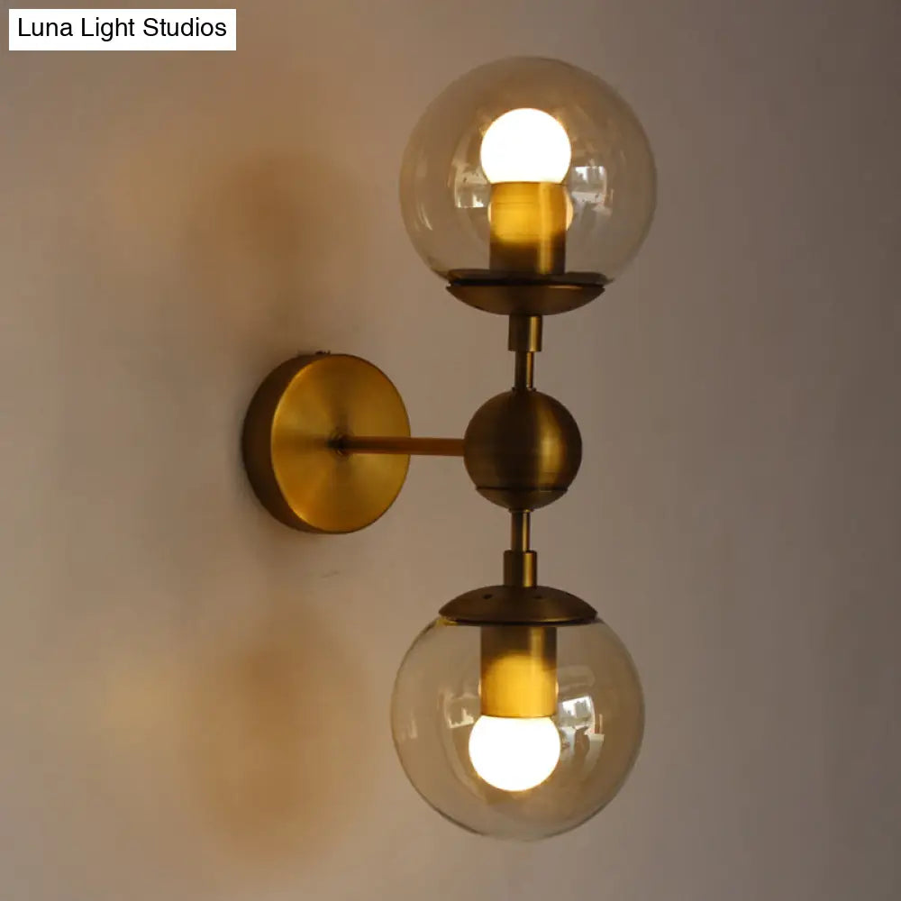 DecorBites™ Post Modern Amber Glass Globe Wall Sconce with Brass Mount - 1/2 Light