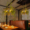 DecorBites™ Rustic Metal Pendant Lamp with Green Leaves Deco - 3 Light, Black – Ideal for Restaurants