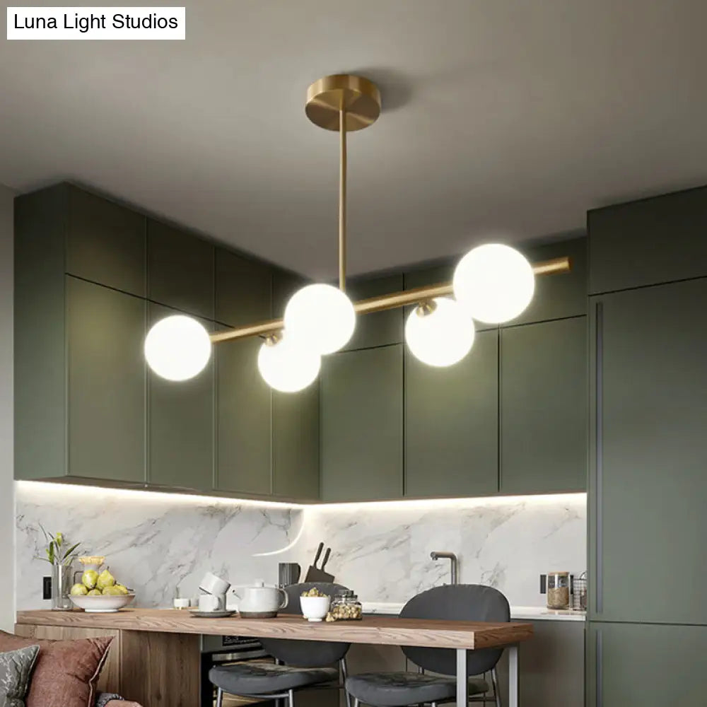 DecorBites™ Sleek and Elegant Linear Gold Island Pendant Lighting with Spherical Glass Shades for Dining Table
