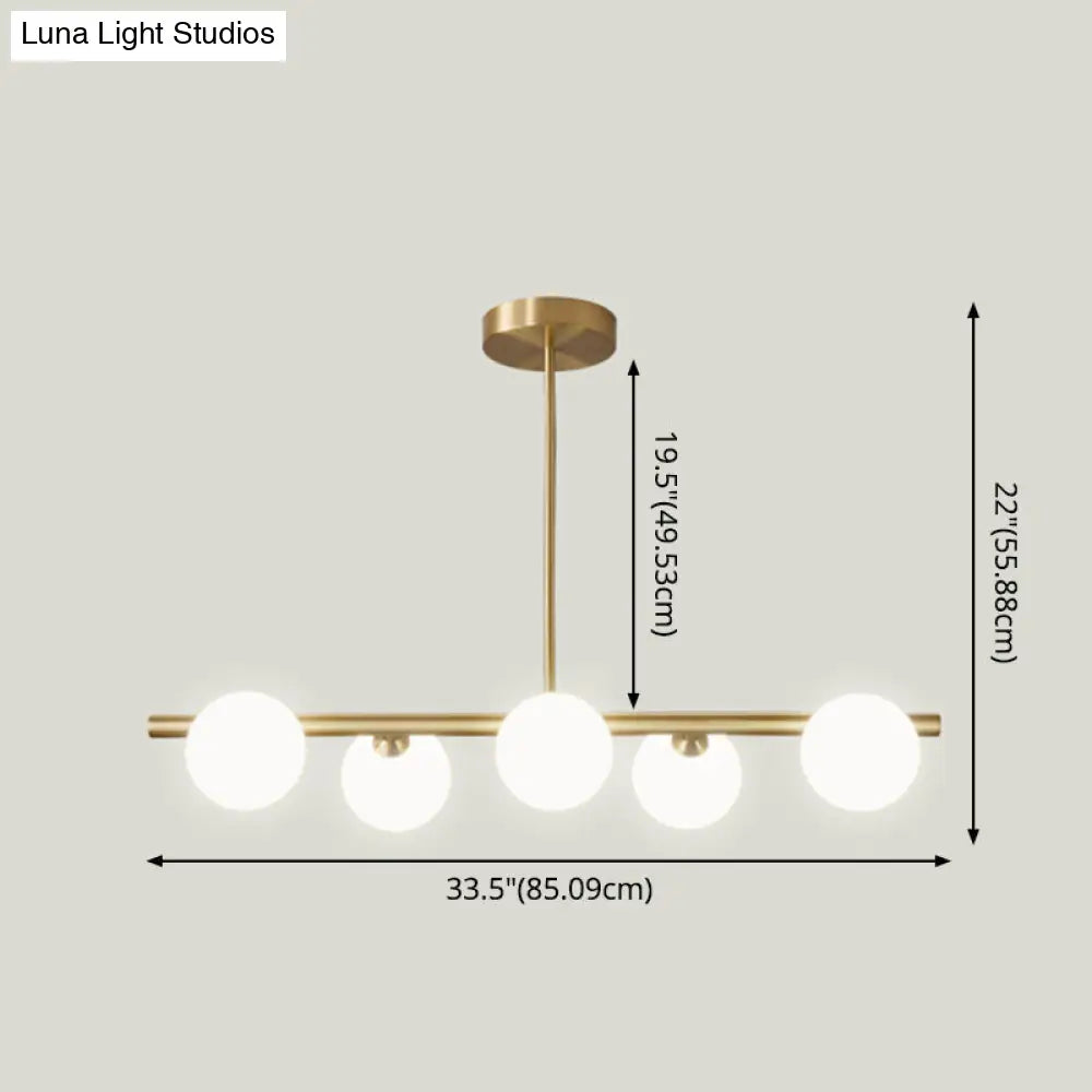 DecorBites™ Sleek and Elegant Linear Gold Island Pendant Lighting with Spherical Glass Shades for Dining Table
