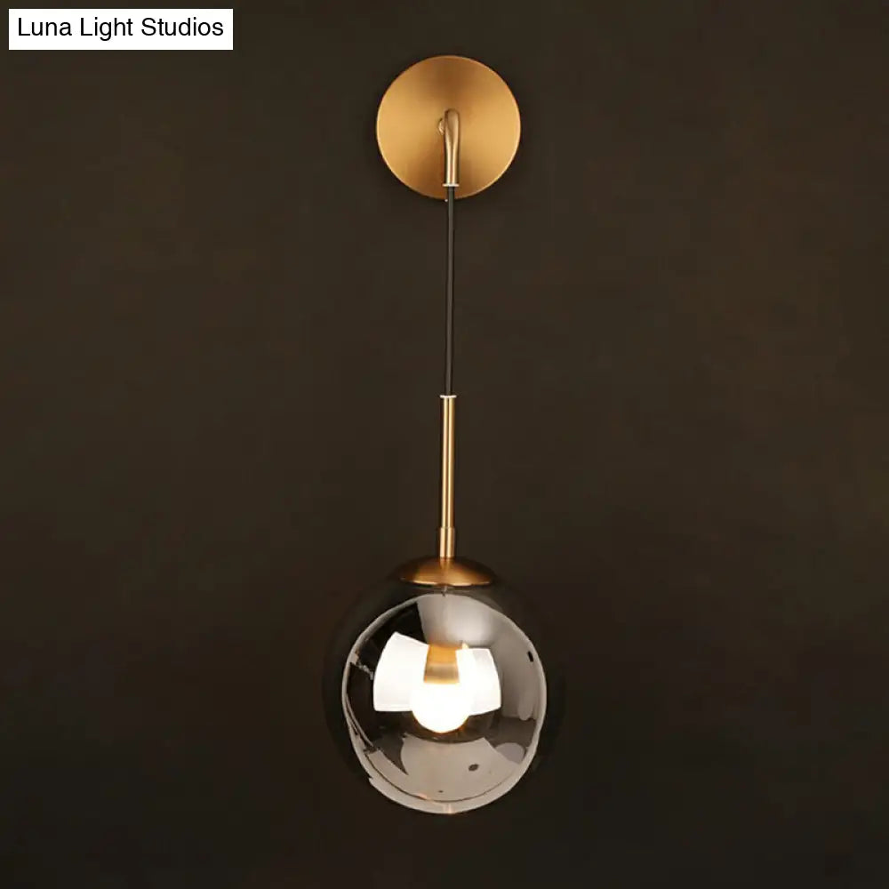 DecorBites™ Sleek Silver Glass Ball Wall Hanging Lamp with Brass Mount - Perfect Bedroom Lighting Solution